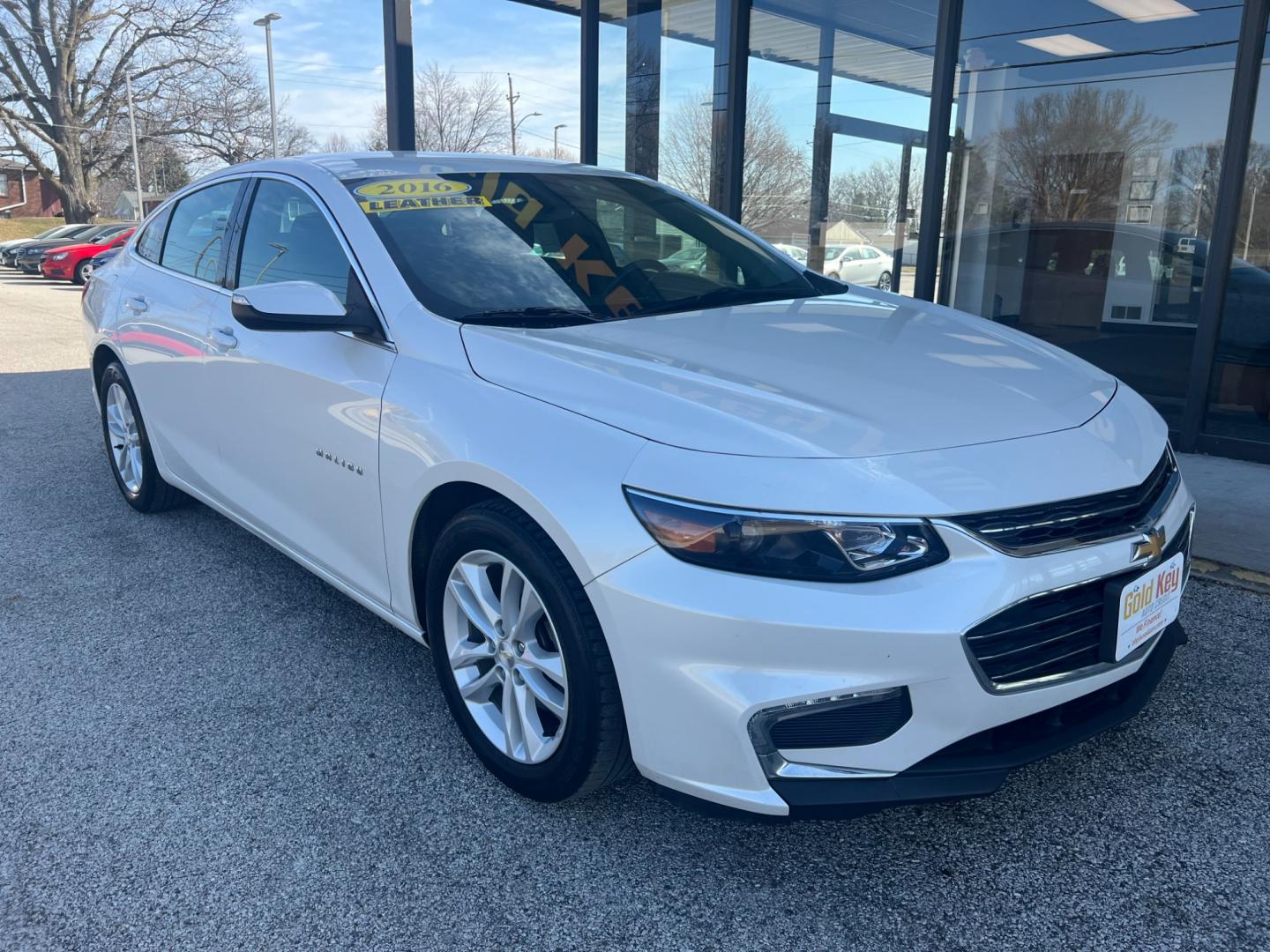 2016 Summit White Chevrolet Malibu 1LT (1G1ZE5ST2GF) with an 1.5L L4 DOHC 16V engine, 6-Speed Automatic transmission, located at 1633 W Kimberly, Davenport, IA, 52806, (563) 323-5341, 41.559456, -90.598732 - Photo#1